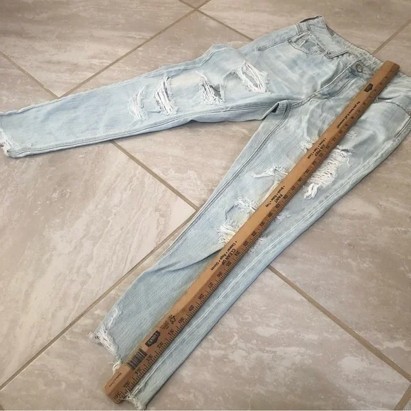American Eagle TomGirl Super Distressed Light Blue Jeans Size 0 - Picture 10 of 12